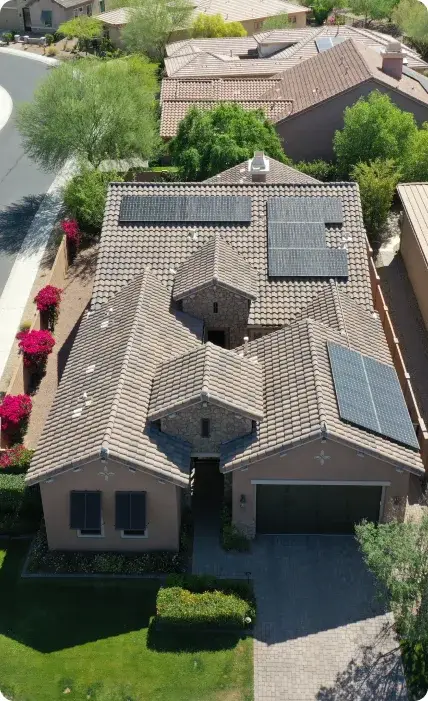Aerial view of a Cave Creek, Arizona home with rooftop solar panels